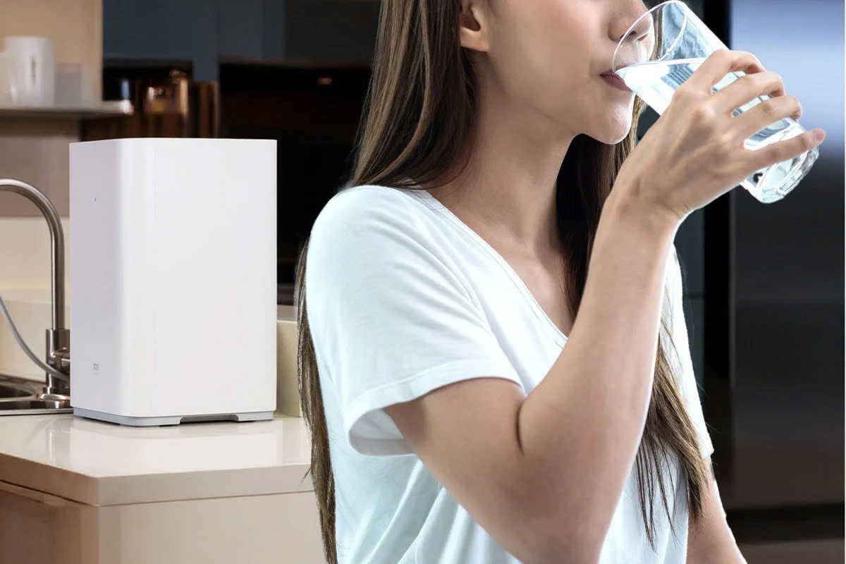 Uong 'nuoc thai' suot 5 nam do loi lap dat may loc nuoc o Trung Quoc hinh anh