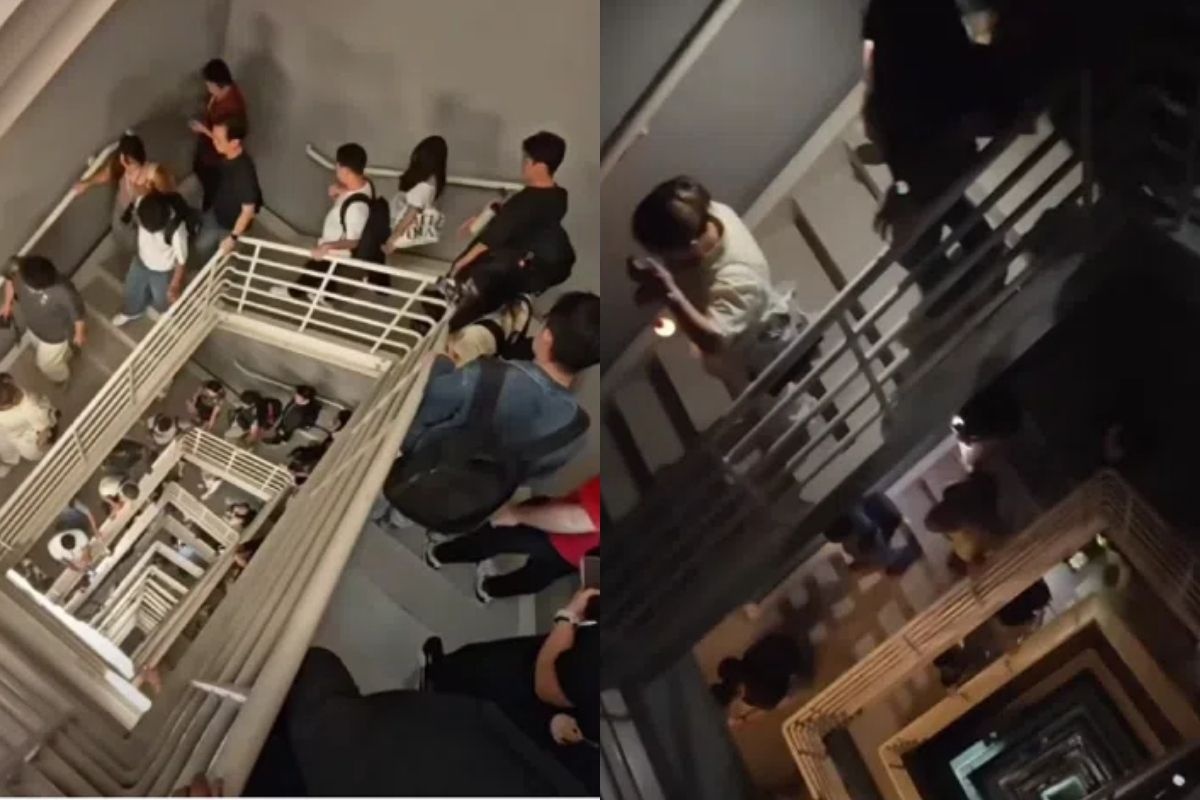 Nhan vien toa nha choc troi leo cau thang hon 100 tang vi cup dien hinh anh