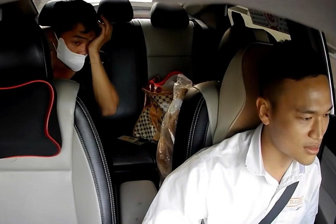 Thuong ong bo ngheo co con nguy kich, tai xe taxi cho mien phi hinh anh