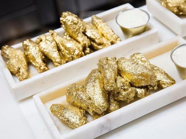 Dang cap canh ga dat vang 1.000 USD lam moi nguoi an lap lanh hinh anh