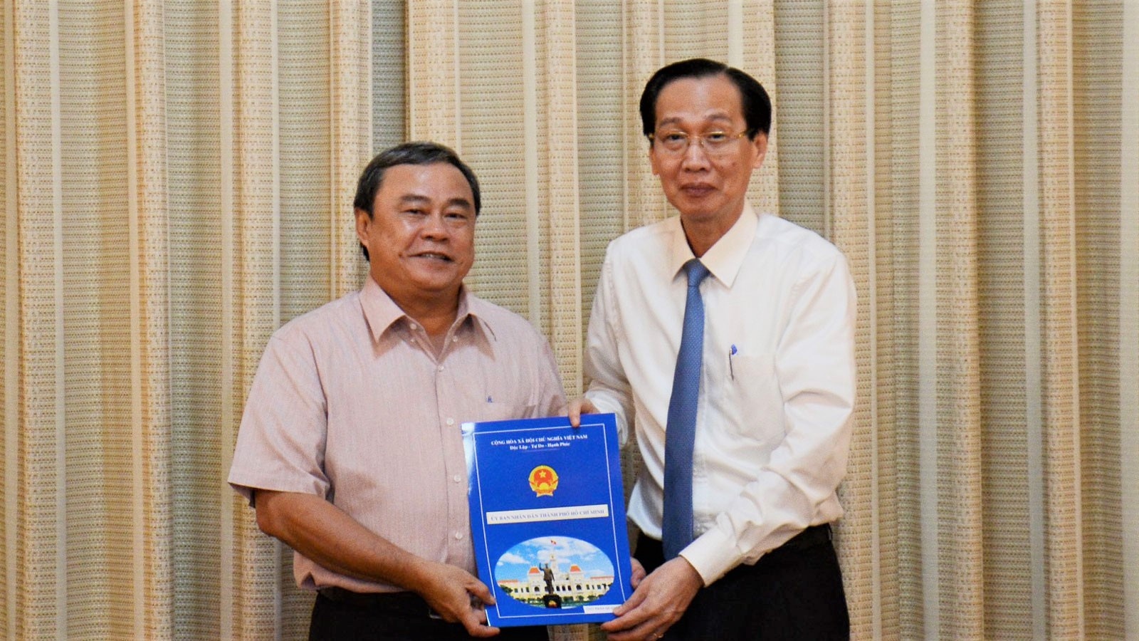 Chu tich quan 3 Tran Quang Ba anh 1