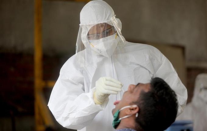 Nguoi Trung Quoc vuot bien am tinh 3 lan truoc khi mac Covid-19 hinh anh