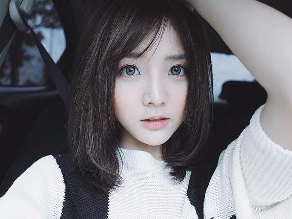 Hot girl Thai Lan mac ao dai cover 'Ly cay bong' hinh anh