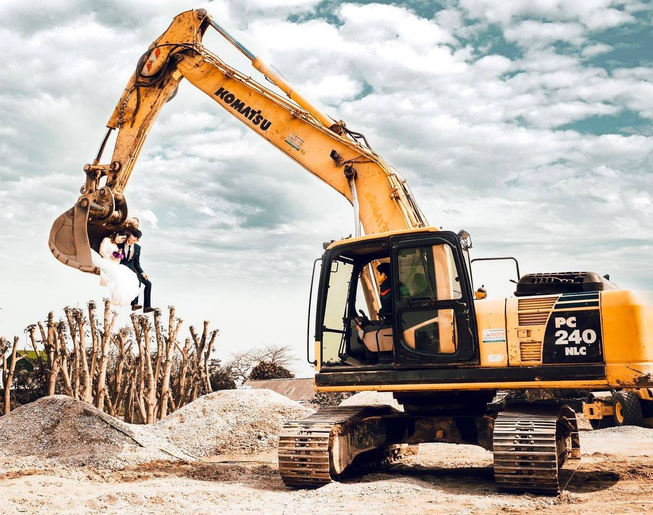 chu re Nghe An chup anh cuoi ben may xuc anh 2