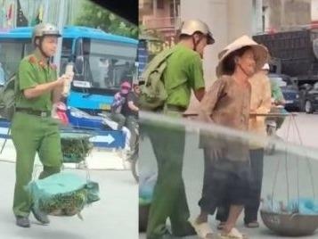 Nam sinh canh sat giua trua nang giup 2 ba cu ganh rau qua duong hinh anh