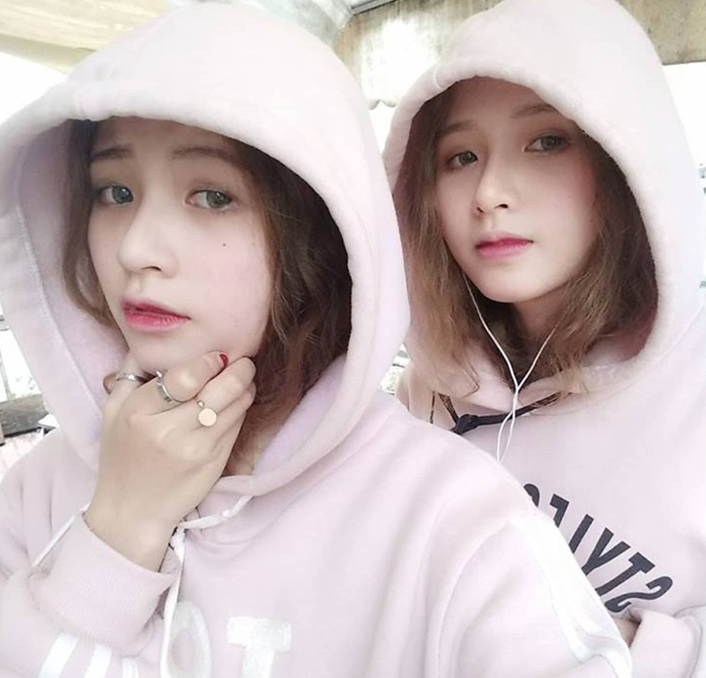 cap chi em sinh doi bi nham la con lai Han Quoc anh 1