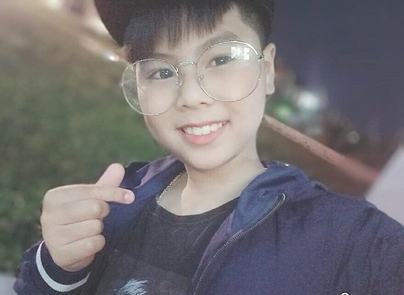 Cau be 11 tuoi hat cheo ve phong chong dich Covid-19 hinh anh