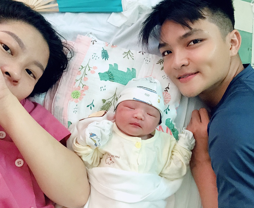 nam tai xe dua san phu di benh vien trong mua bao anh 2