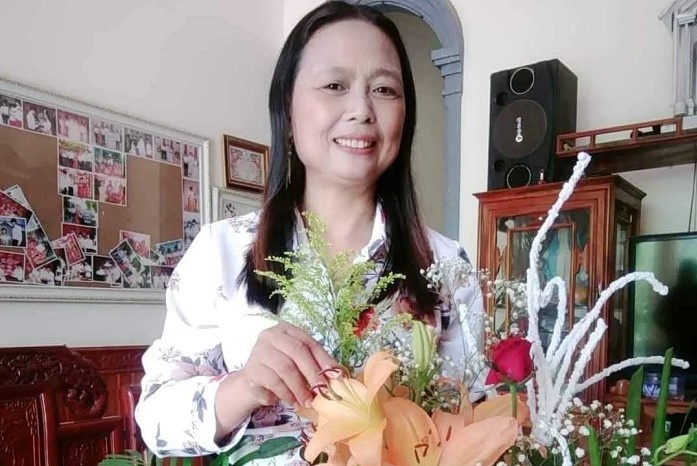 Nguoi phu nu tim chu nhan chiec tui dung gan 100 trieu de tra hinh anh