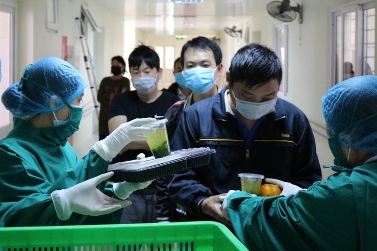 Hai Phong dieu chinh, bo thu phi nguoi cach ly ve tu vung dich hinh anh