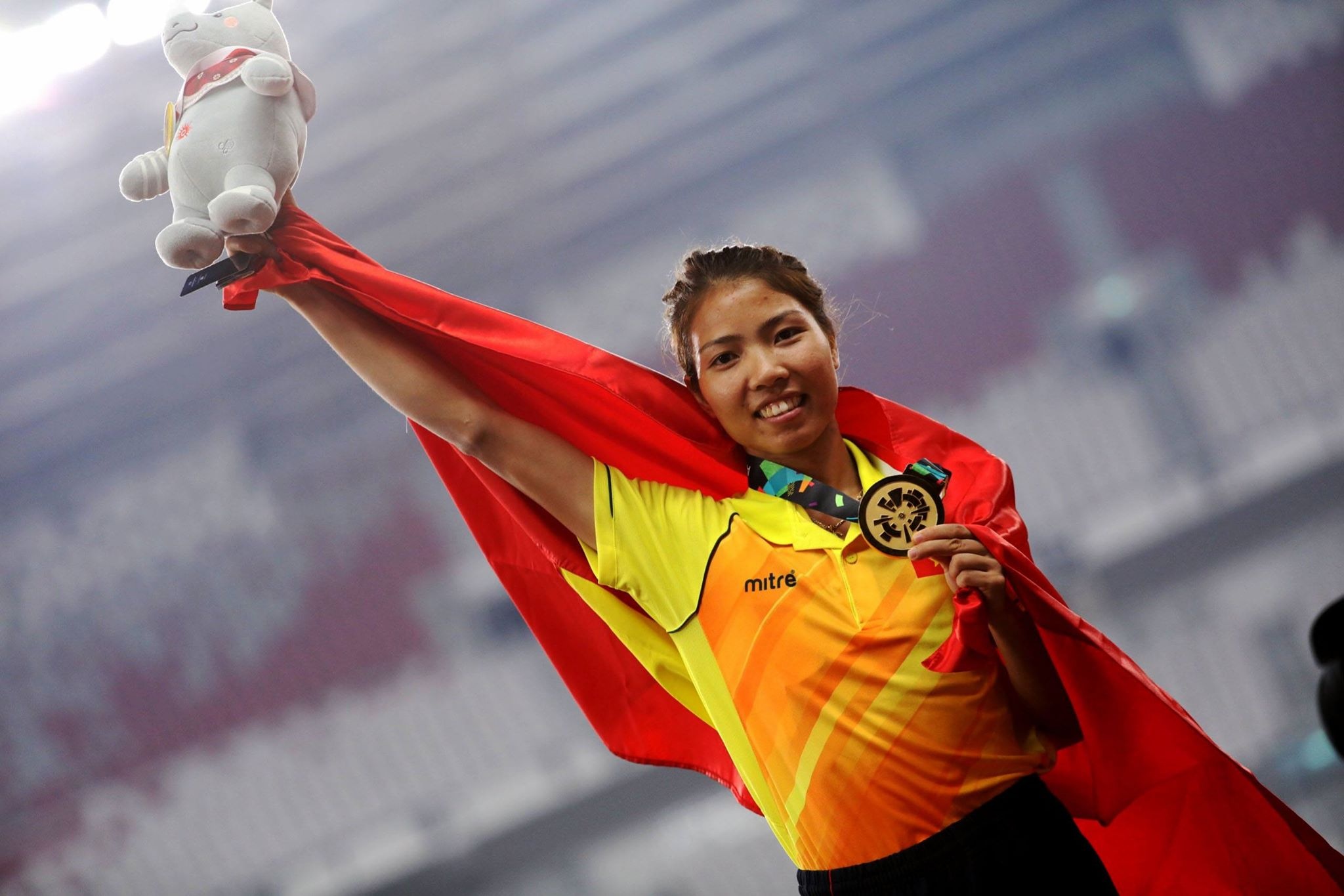 Bui Thi Thu Thao duoc thuong gan nua ty dong sau HCV ASIAD lich su hinh anh