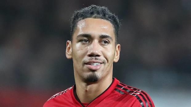 Chris Smalling dat thoa thuan roi Man United hinh anh