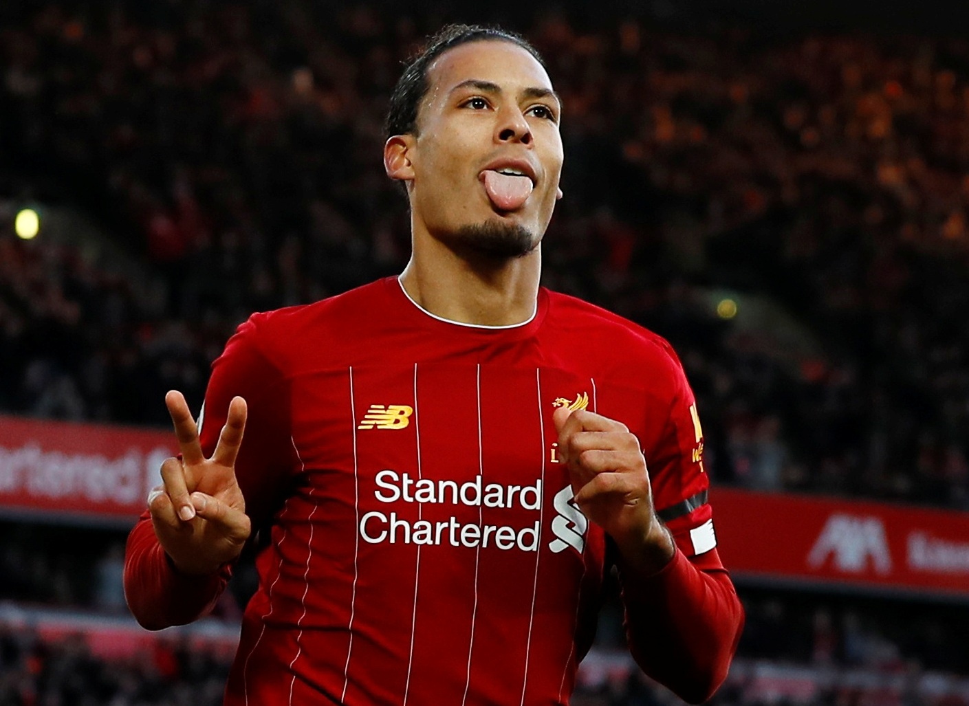 Liverpool hon Man City 11 diem sau khi thang Brighton 2-1 hinh anh