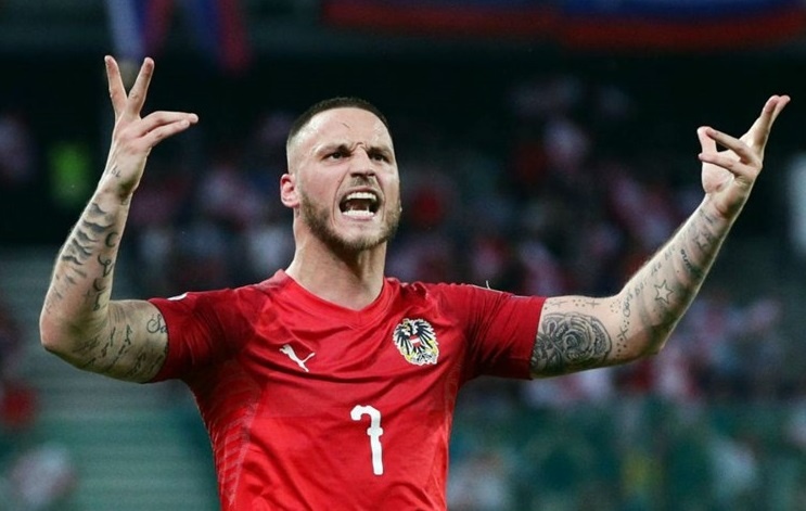 Arnautovic khong the roi Trung Quoc vi tat ca may bay bi cam cat canh hinh anh