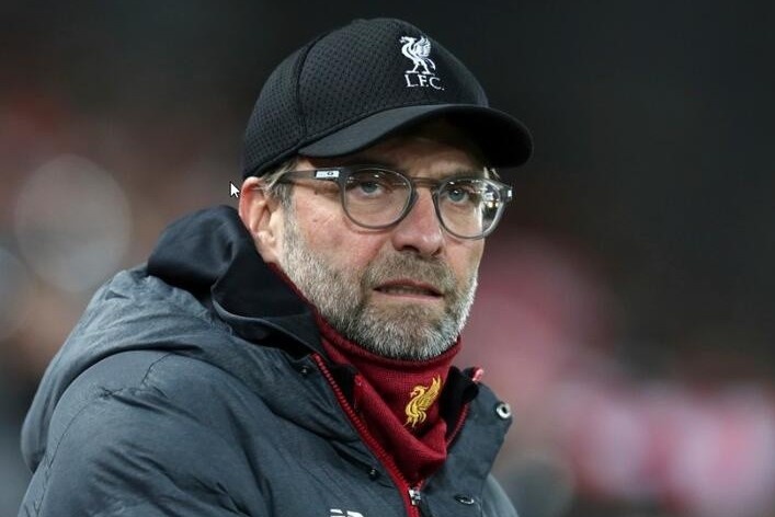 Klopp van lac quan du Liverpool vo mong an ba hinh anh