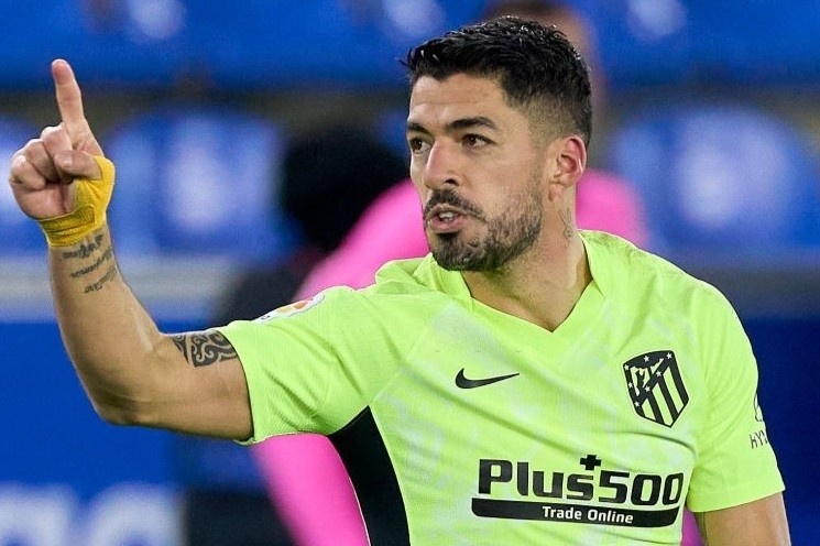Suarez dua Atletico tro lai ngoi dau La Liga hinh anh