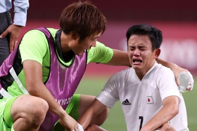 Olympic Nhat Ban guc nga o tran tranh HCD hinh anh