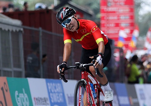 Nha vo dich xe dap chau A Nguyen Thi That cay dang bai tran o ASIAD hinh anh