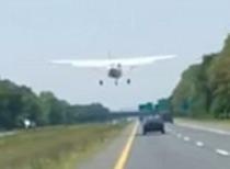 May bay ha canh ngay truoc mui oto tren duong cao toc My hinh anh