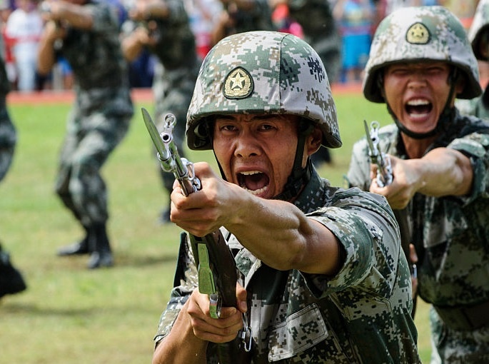 Trung Quoc lo so nghien game pha huy suc manh quan doi hinh anh