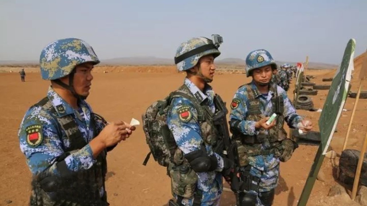 Trung Quoc trong tam bao xung dot tai Sung chau Phi hinh anh