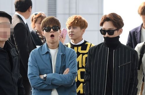 EXO, SHINee mat moc, ngai ngu o san bay Han sang Viet Nam hinh anh