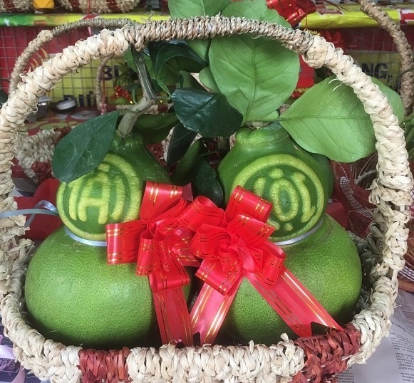 Chua Tet, nguoi Sai Gon da san buoi ho lo, dua thoi vang gia bac trieu hinh anh