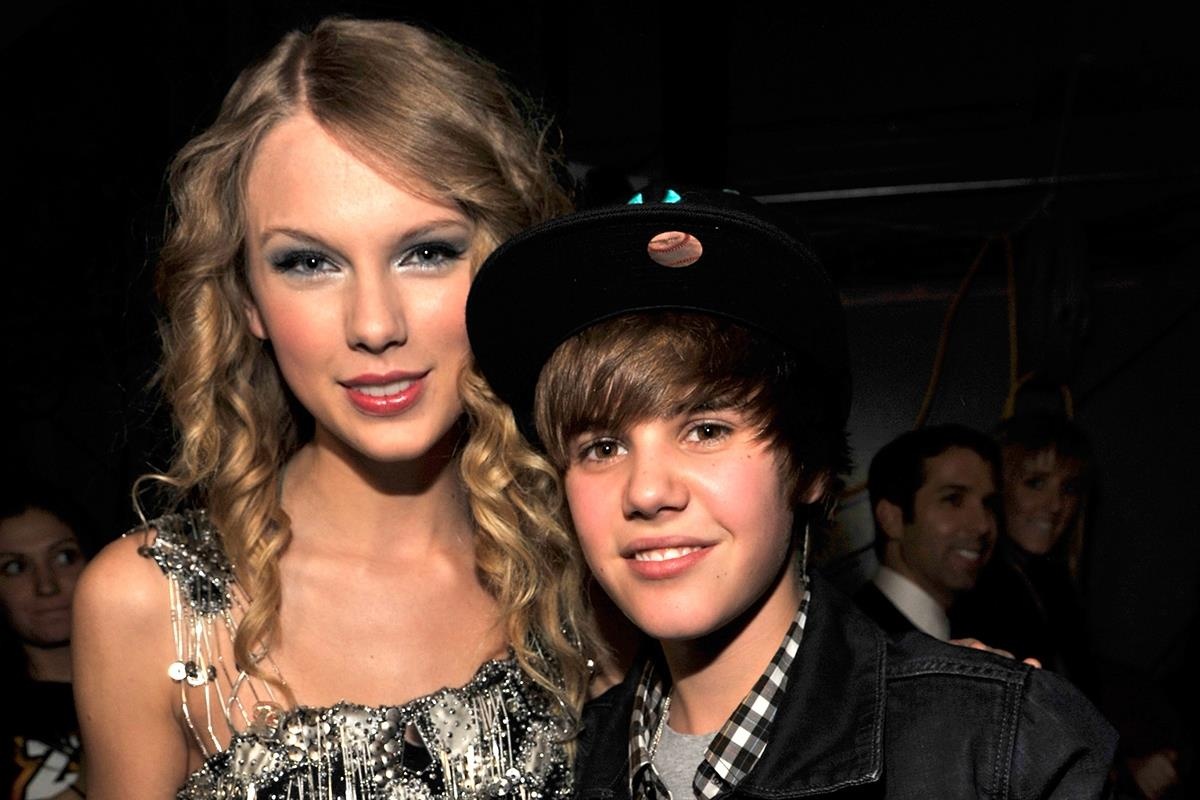 Taylor Swift tranh cai tay doi voi Justin Bieber hinh anh