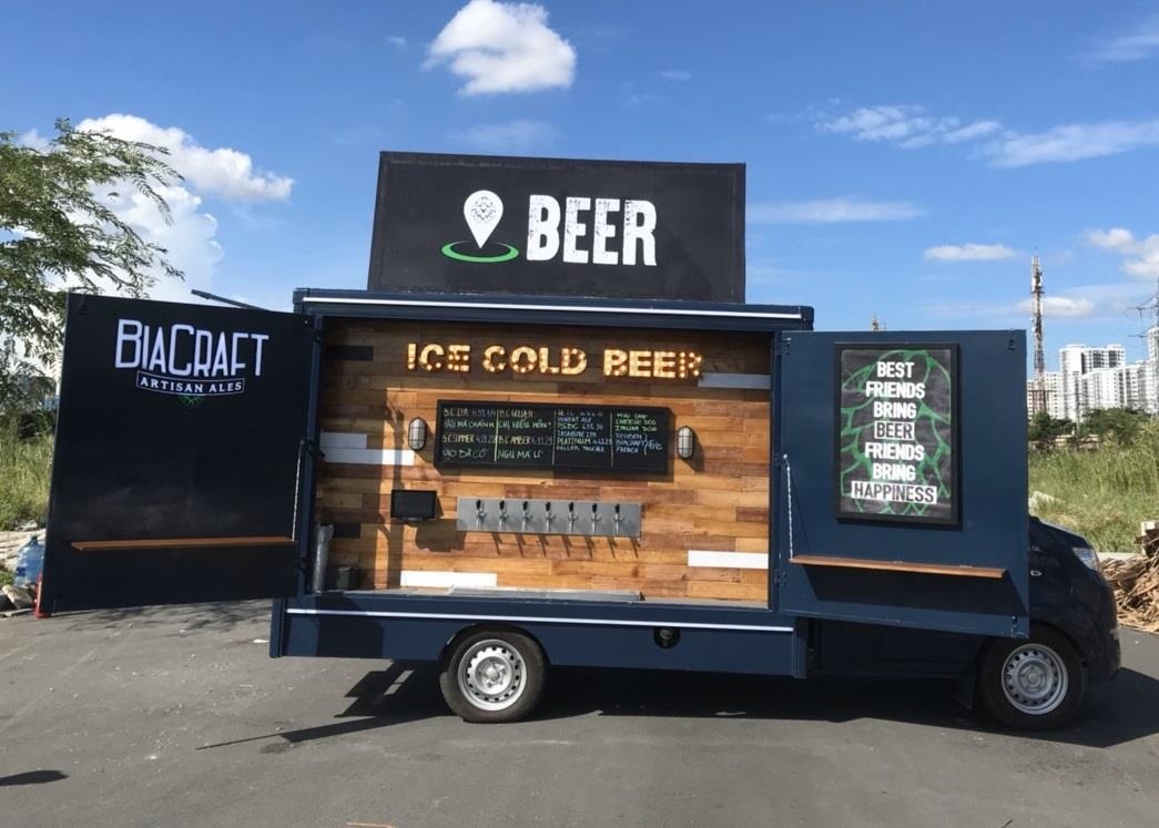 Trai nghiem xe tai ban bia thu cong dau tien o TP.HCM hinh anh