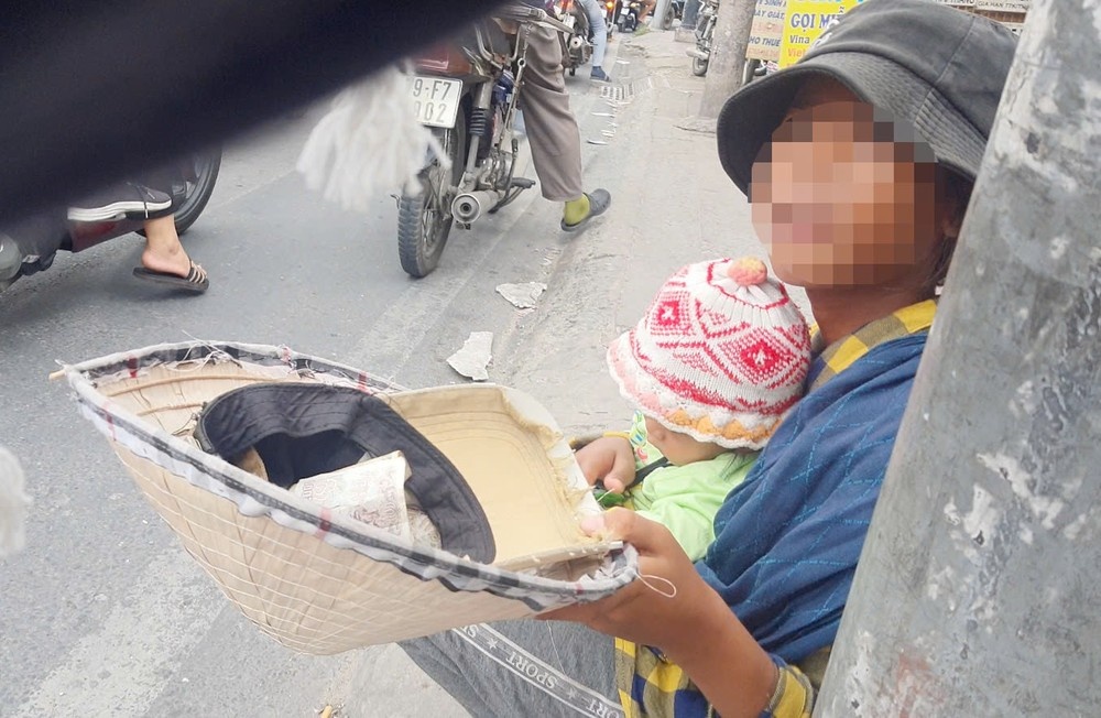 Bi mat dang sau tre an xin o TP.HCM - So Lao dong noi gi? hinh anh