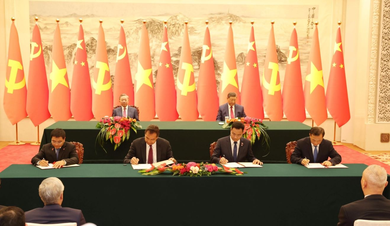 Tong Bi thu Viet Nam - Trung Quoc chung kien Le ky van kien hop tac hinh anh