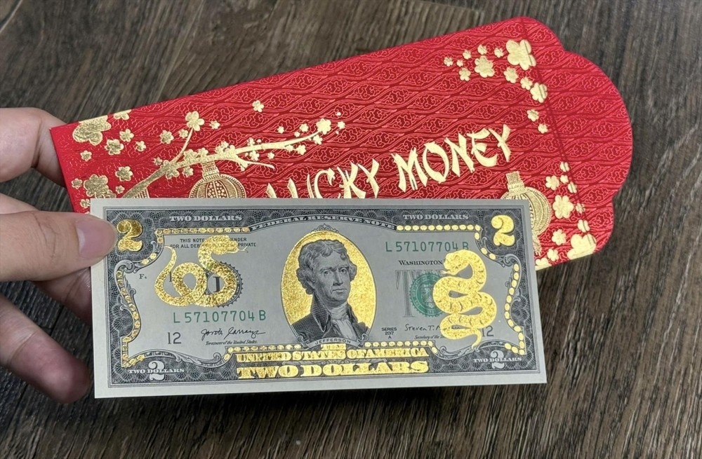 Mua, doi tien moi, tien luu niem - coi chung vi pham phap luat hinh anh