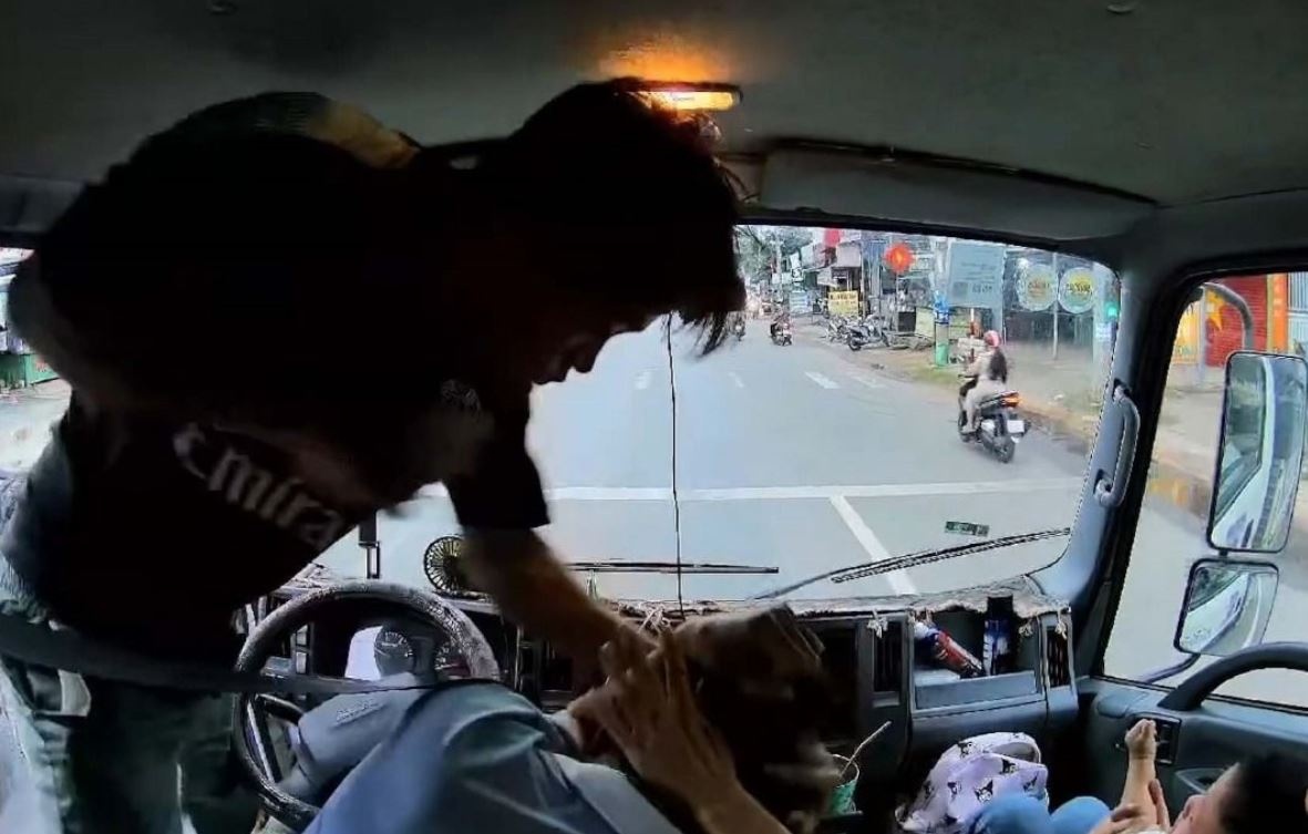 Binh Phuoc xac minh, xu ly vu tai xe xe tai bi chan danh hinh anh