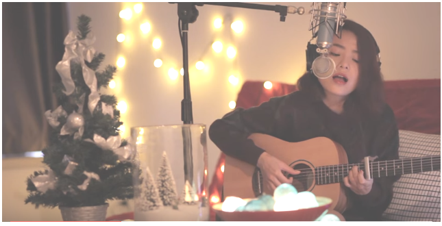 Thai Trinh om dan, hat mung Giang sinh hinh anh