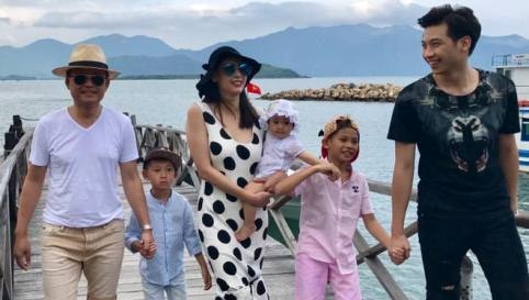 Vo chong Ha Kieu Anh dua 4 con di nghi duong hinh anh