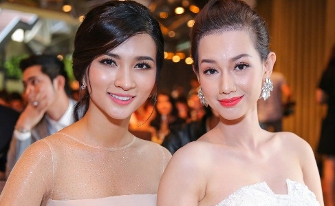 Quynh Chi va Kim Tuyen do sac trong su kien hinh anh