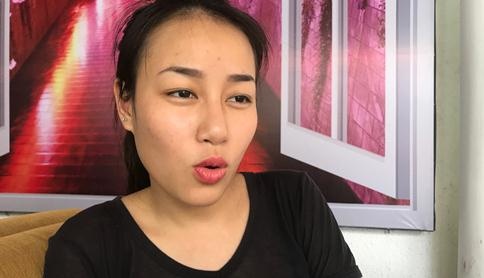 Clip nguoi mau Minh Trang ke chuyen bi chong bao hanh, bat con hinh anh