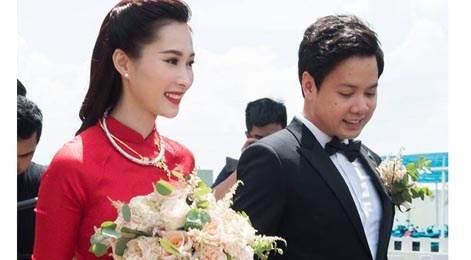 Hoa hau Dang Thu Thao rang ngoi ben chong dai gia trong le ruoc dau hinh anh