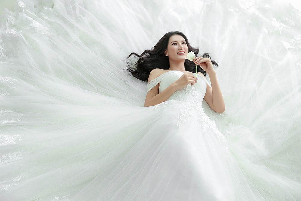 Anh cuoi cua Trang Tran va ong xa anh 9