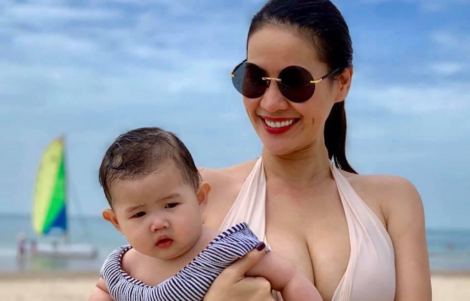 Than Thuy Ha tu tin mac bikini sau 4 thang sinh con gai hinh anh