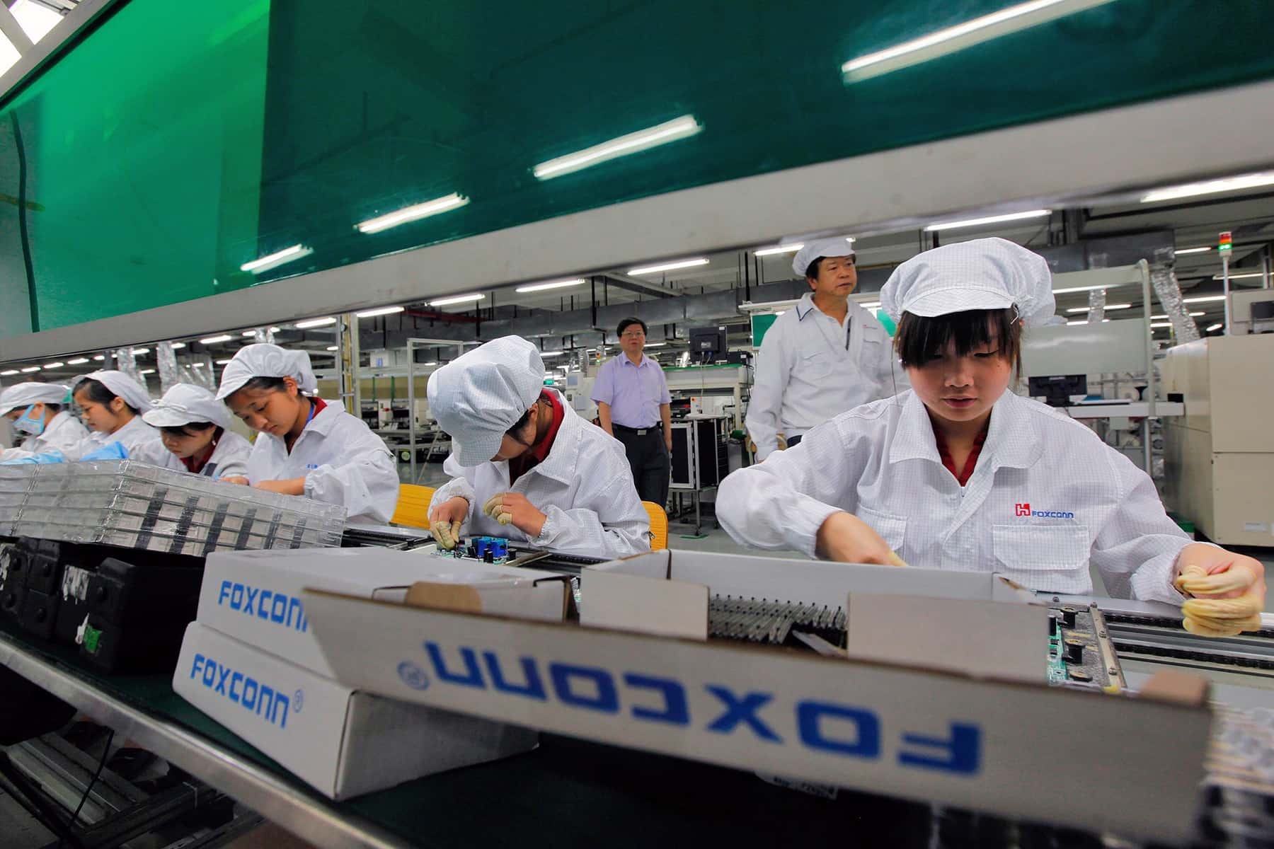 Toyota va Apple tam dung san xuat o Trung Quoc vi cat dien hinh anh