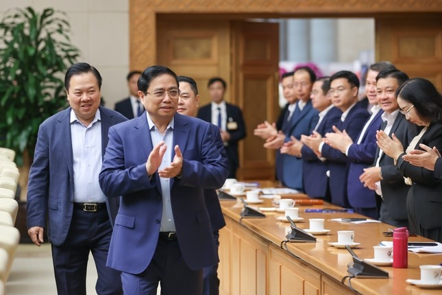 Thu tuong ra yeu cau doanh nghiep Nha nuoc sap xep, tinh gon bo may hinh anh