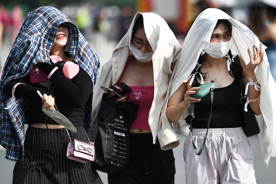 Thoi tiet mien Bac thang 3 nhieu bien dong, nang nong xuat hien som hinh anh