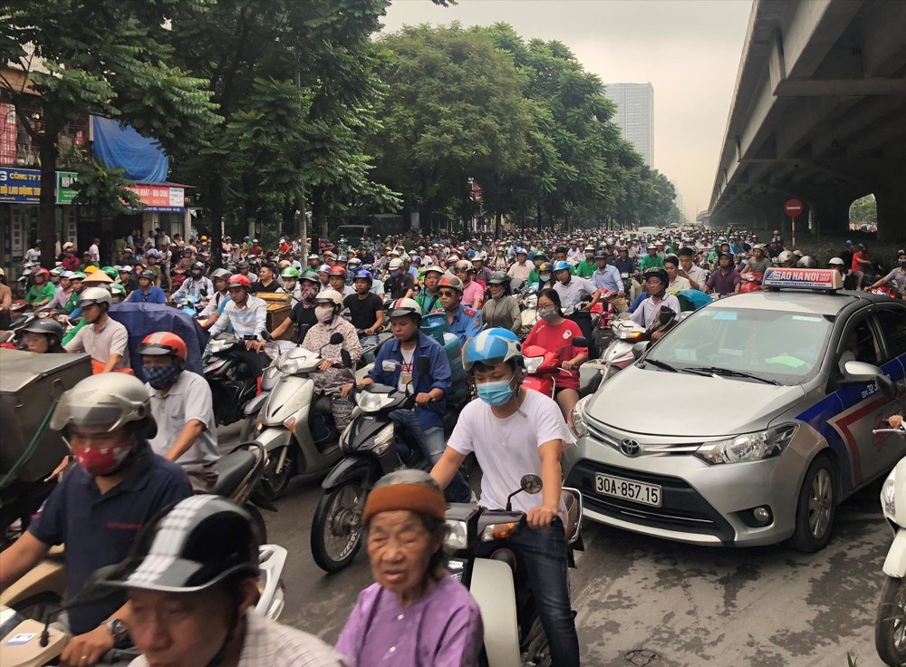 Giai phap nao giam o nhiem khong khi o Ha Noi? hinh anh