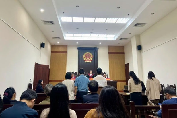Tu 'ap gia' boi thuong khong co su thoa thuan hinh anh
