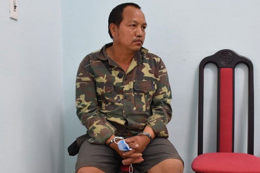 Bat giu toi pham tron na 10 nam tai Lao hinh anh