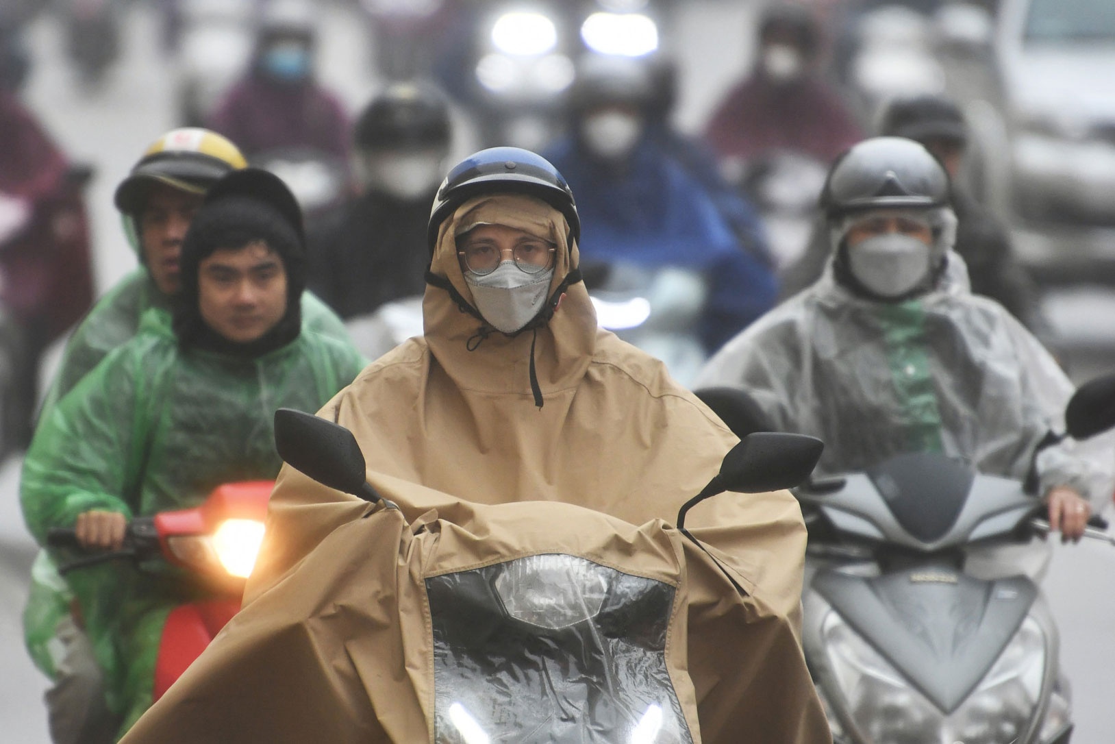 Khong khi lanh tran ve, mien Bac nhieu noi mua to hinh anh