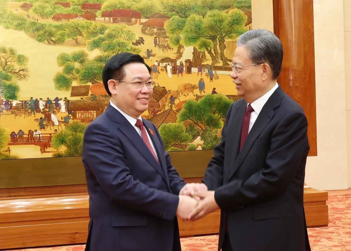 Chu tich Quoc hoi hoi dam voi Chu tich Quoc hoi Trung Quoc hinh anh