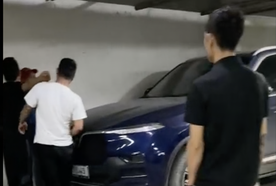 Hai bao ve to bi danh 'hoi dong' tai ham chung cu hinh anh