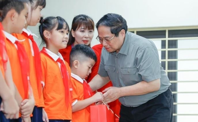 Thu tuong: Tre em la hanh phuc cua gia dinh, tuong lai cua dat nuoc hinh anh